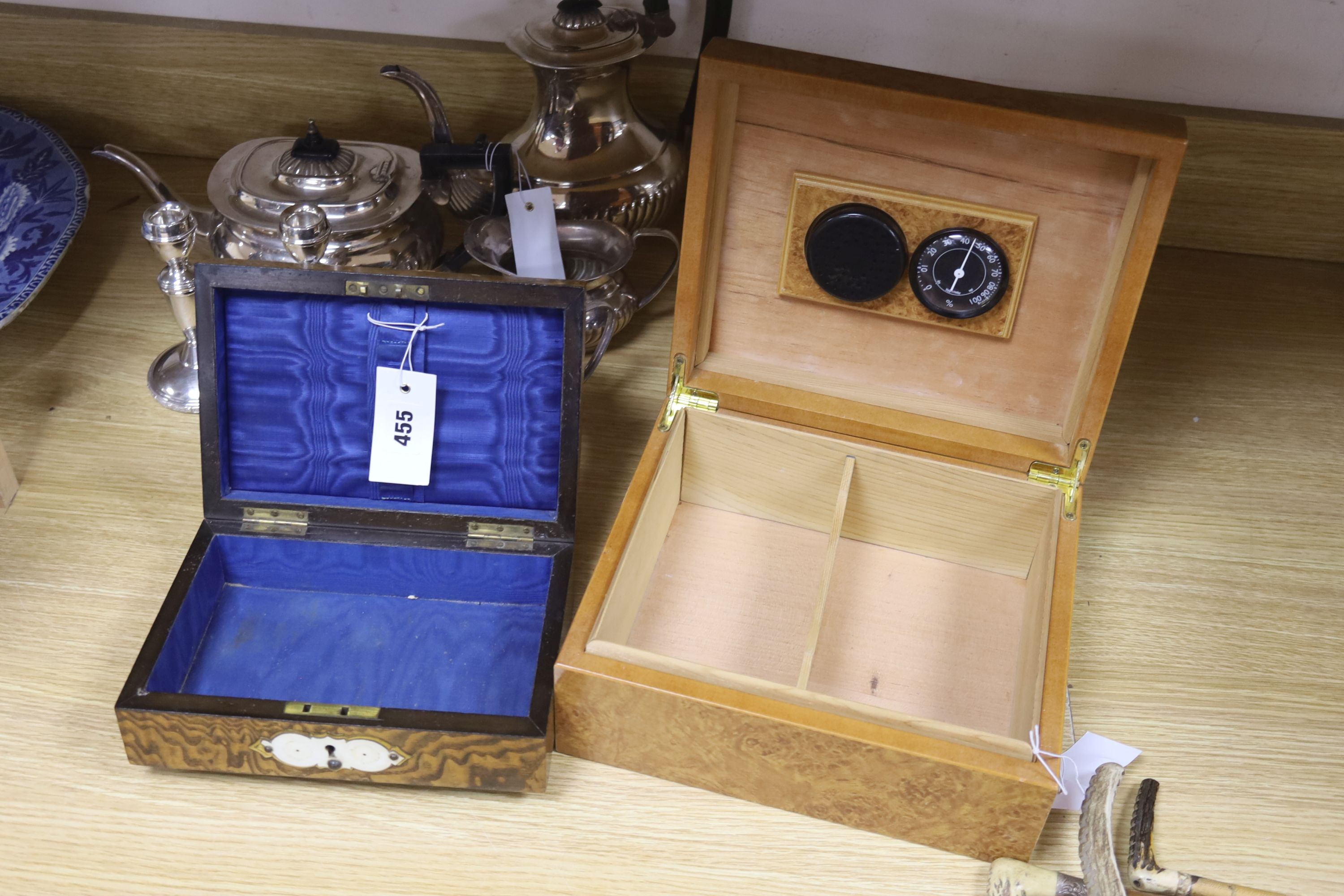 A Victorian studded box, a modern humidor, two candlesticks and a four piece silver plated tea set